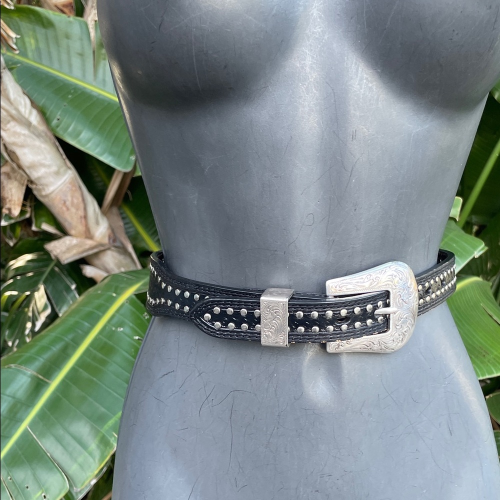 Engraved silver and studded, leather cowboy belt